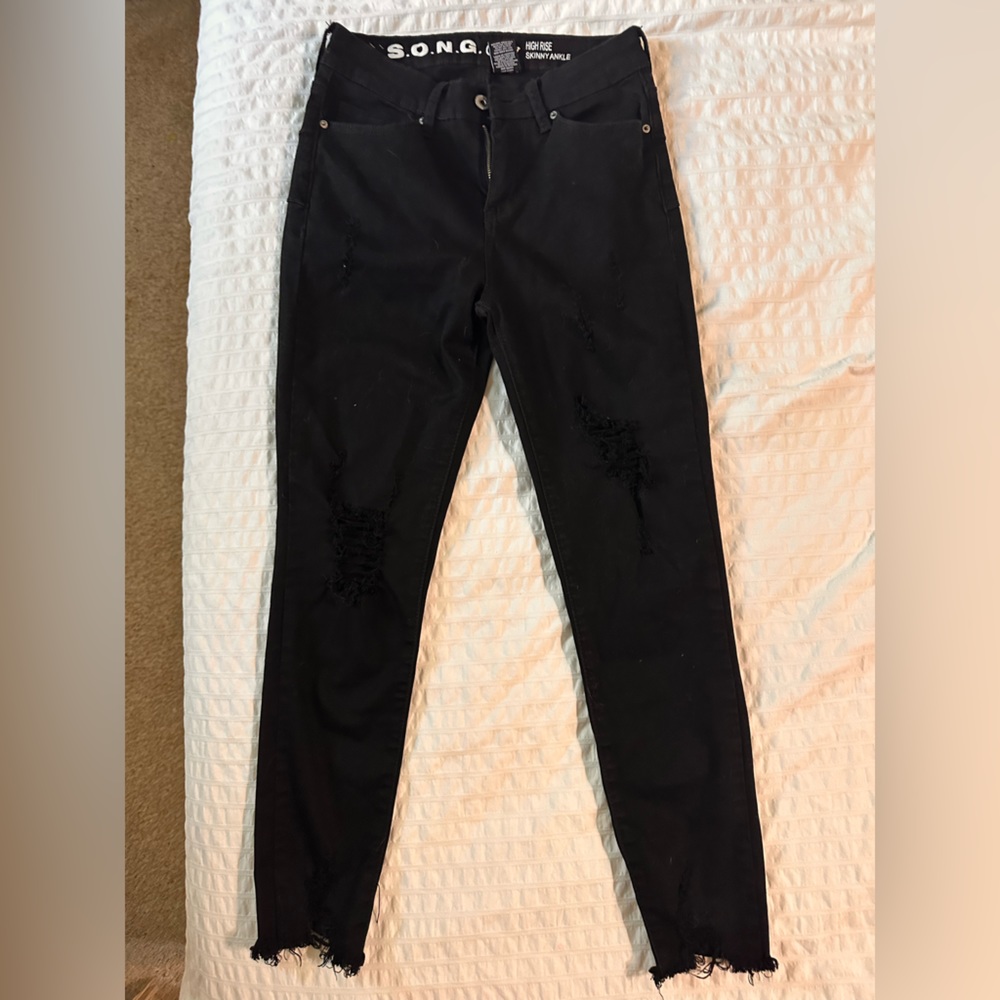 Distressed black crop jeans
